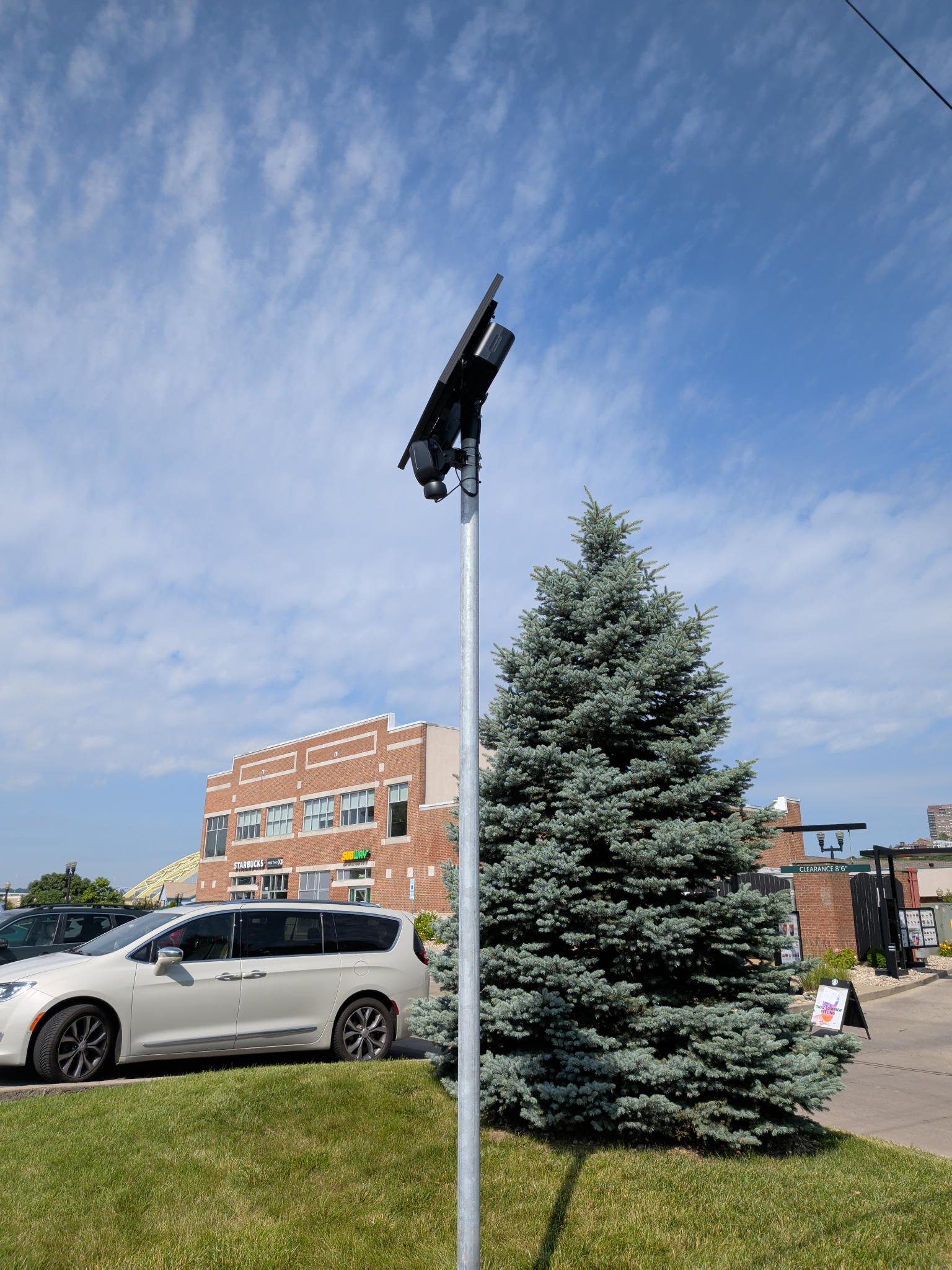 Flock Camera mounted on a pole at Fairfield Ave & Patchen Ave next to Starbucks